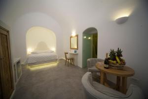 Cama ou camas em um quarto em Fanari Vista Suites