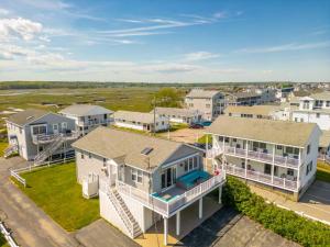 an aerial view of a house with a pool at 2-Min Walk to Beach Large Deck with Outdoor Sofas in Wells
