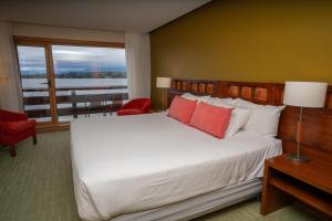 Un ou plusieurs lits dans un hébergement de l'établissement Wyndham Puerto Varas Pettra