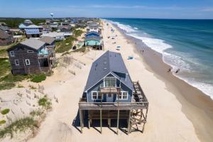 een luchtzicht op een huis op het strand bij 7133 - Barefoot in Grun Island