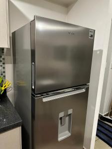 Kuchyň nebo kuchyňský kout v ubytování Cómodo departamento en el centro