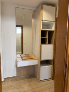 a bathroom with a sink and a mirror at Villa Firenze in Ulcinj