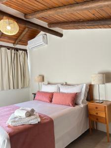 Ένα ή περισσότερα κρεβάτια σε δωμάτιο στο Flats Bon Voyage Caboré - Chez Cira