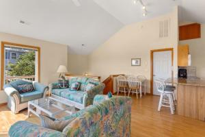 a living room with a couch and a table at 1680 - Hopes and Dreams in Poplar Branch
