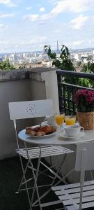 Balkón nebo terasa v ubytování Élégant apt avec vue Tour Eiffel & parking privé