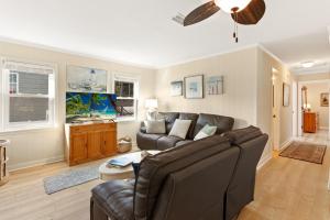 a living room with a couch and a table at 5010 - Home Sweet Helga in Avalon Bench