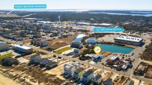 an aerial view of a city with buildings and a highway at 5062 - Our Bright Idea in Kill Devil Hills +39 photos