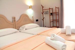 Ένα ή περισσότερα κρεβάτια σε δωμάτιο στο MARITIM CENTRAL - Habitaciones Deluxe, cocina
