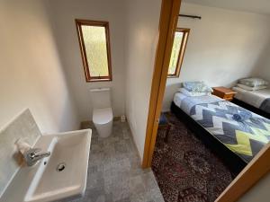 Postel nebo postele na pokoji v ubytování Qt inntouch + 53 fotografií