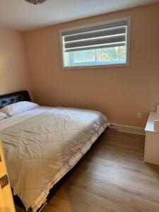 Postel nebo postele na pokoji v ubytování private apartment 2nd bed extra twenty dollars cash
