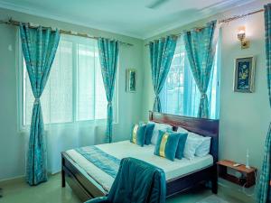 Postel nebo postele na pokoji v ubytování Legrand Marie Apartment