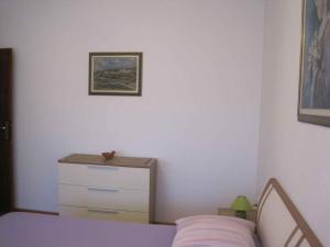 Łóżko lub łóżka w pokoju w obiekcie Apartment in Zadar - Zadar Riviera 7970
