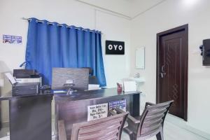 Μια τηλεόραση ή/και κέντρο ψυχαγωγίας στο Hotel O REDDY'S GRAND LUXURY ROOMS +56 φωτογραφίες