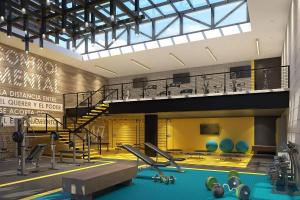 a large gym with a swimming pool and a treadmill at Petapolis apartment in Guatemala