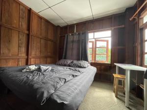 Postel nebo postele na pokoji v ubytování Stay with sumo homestay