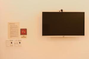 TV a/nebo společenská místnost v ubytování APT Hotel Phan Rang