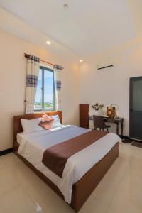 Postel nebo postele na pokoji v ubytování APT Hotel Phan Rang + 37 fotografií