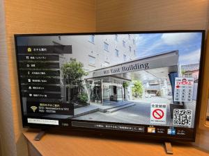 TV a/nebo společenská místnost v ubytování Kanazawa Central Hotel Annex
