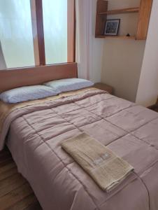 En eller flere senge i et værelse på La Casa de Lily