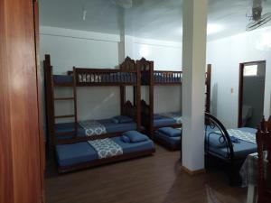 Postel nebo postele na pokoji v ubytování Casa Caxandra