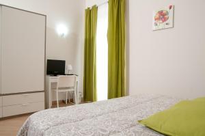 Postel nebo postele na pokoji v ubytování B&B Notti Sikane
