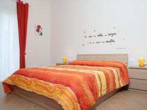 Postel nebo postele na pokoji v ubytování B&B Notti Sikane