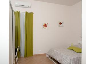 Giường trong phòng chung tại B&B Notti Sikane