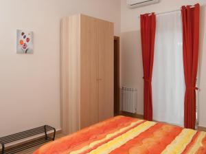 Postel nebo postele na pokoji v ubytování B&B Notti Sikane