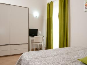 Postel nebo postele na pokoji v ubytování B&B Notti Sikane