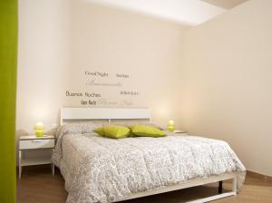 Postel nebo postele na pokoji v ubytování B&B Notti Sikane