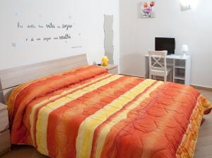 Postel nebo postele na pokoji v ubytování B&B Notti Sikane