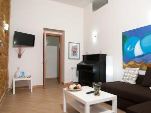 TV a/nebo společenská místnost v ubytování B&B Notti Sikane