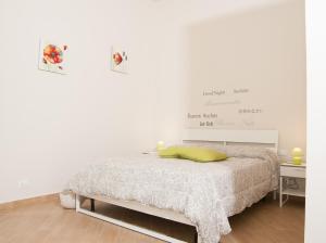 Postel nebo postele na pokoji v ubytování B&B Notti Sikane
