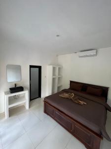 Μια τηλεόραση ή/και κέντρο ψυχαγωγίας στο Kuta Circle Homestay