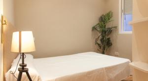 Łóżko lub łóżka w pokoju w obiekcie Suites You Zinc