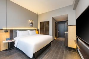 UrCove by HYATT Shanghai Jinqiao Centre 객실 침대