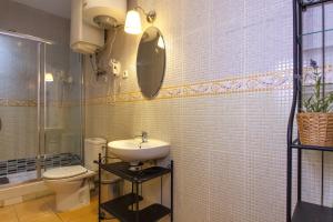 Łazienka w obiekcie Suites You Zinc