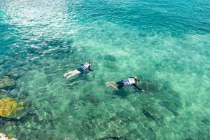 two people swimming in the water in the ocean at Kira Baya Koh Samed in Ko Samed +114 photos