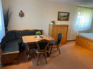 Posezení v ubytování Ferienwohnung An den Galgenteichen