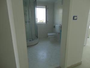 Łazienka w obiekcie Mirakul Apartments