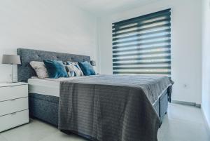 Ένα ή περισσότερα κρεβάτια σε δωμάτιο στο Sunny Beach Penthouse in Horadada +33 φωτογραφίες