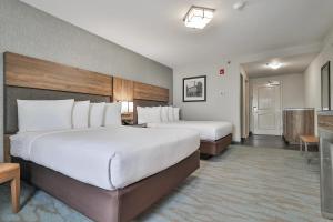 The Penn Stroud, Stroudsburg - Poconos, Ascend Hotel Collection客房内的一张或多张床位