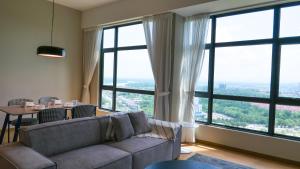 Et opholdsområde på Newston Family City View 2 Bedrooms