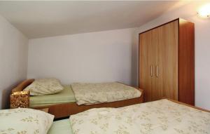 Postel nebo postele na pokoji v ubytování Apartments Vesna