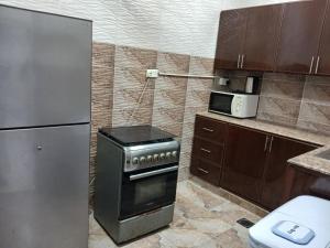 Køkken eller tekøkken på زهره الوادي 2 للشقق المفروشة