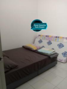 Postel nebo postele na pokoji v ubytování Eleven Homestay Kuala Kangsar + 9 fotografií