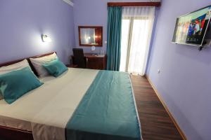 Postel nebo postele na pokoji v ubytování Sirena Marta