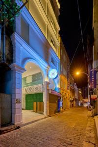 a building that is lit up blue at night at Dutch Heritage Colombo in Colombo +9 photos