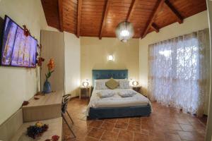 Postel nebo postele na pokoji v ubytování Aiem B&B