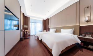 Fotografie z fotogalerie ubytování YISHUI GRAND HOTEl v destinaci Luo-jang